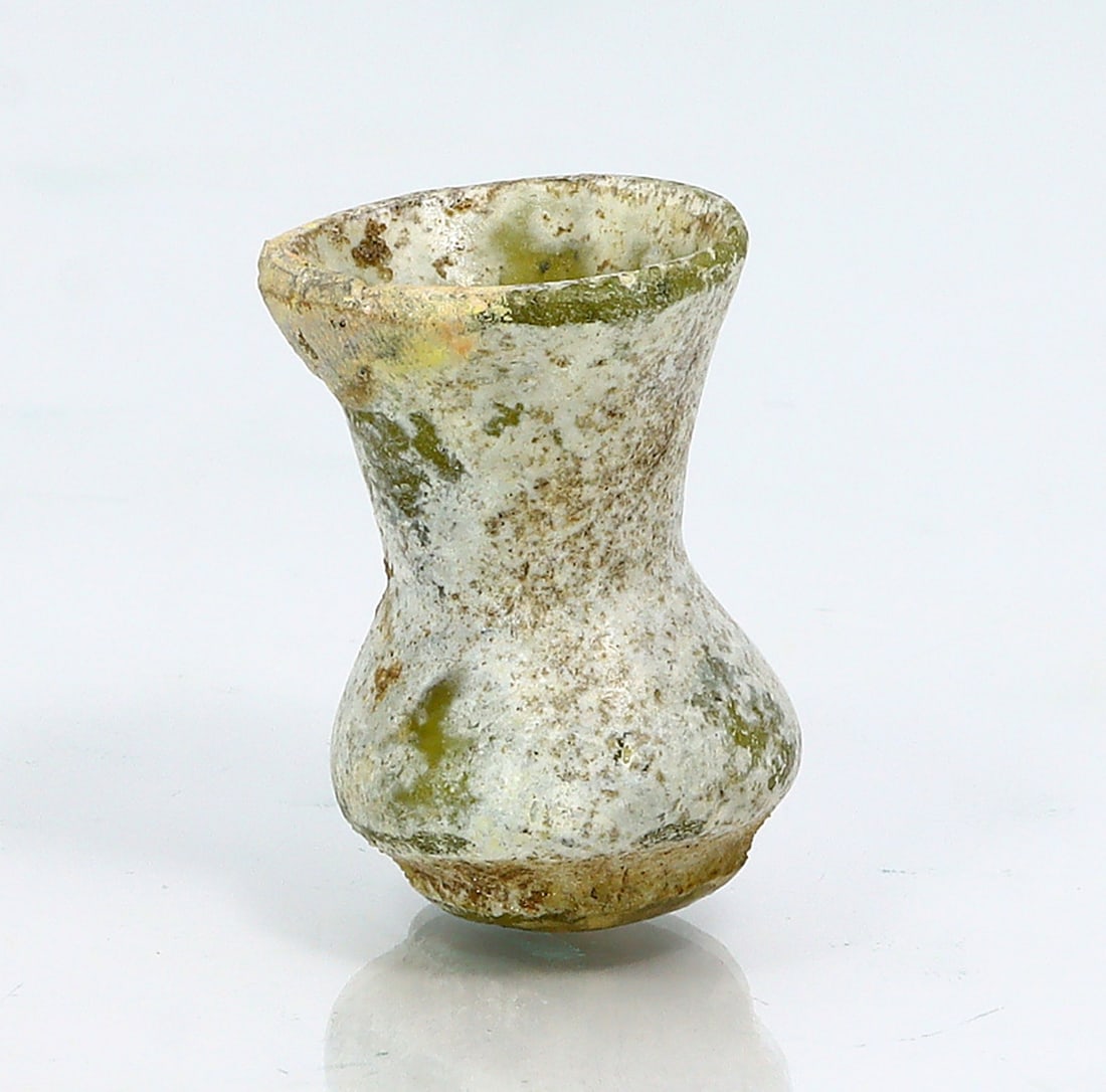 An Ancient Western Asiatic Roman Glass Unguentarium Flask Vessel Art Antique: 1 31/32 inches Weight: 12 grams (Before Packing) Thousand Planet Auction House Season 4: Ten2Go August Collection Auction. A bargain hunter's, fixer-upper's, and pack-rat's dream come true! Our Ten2Go