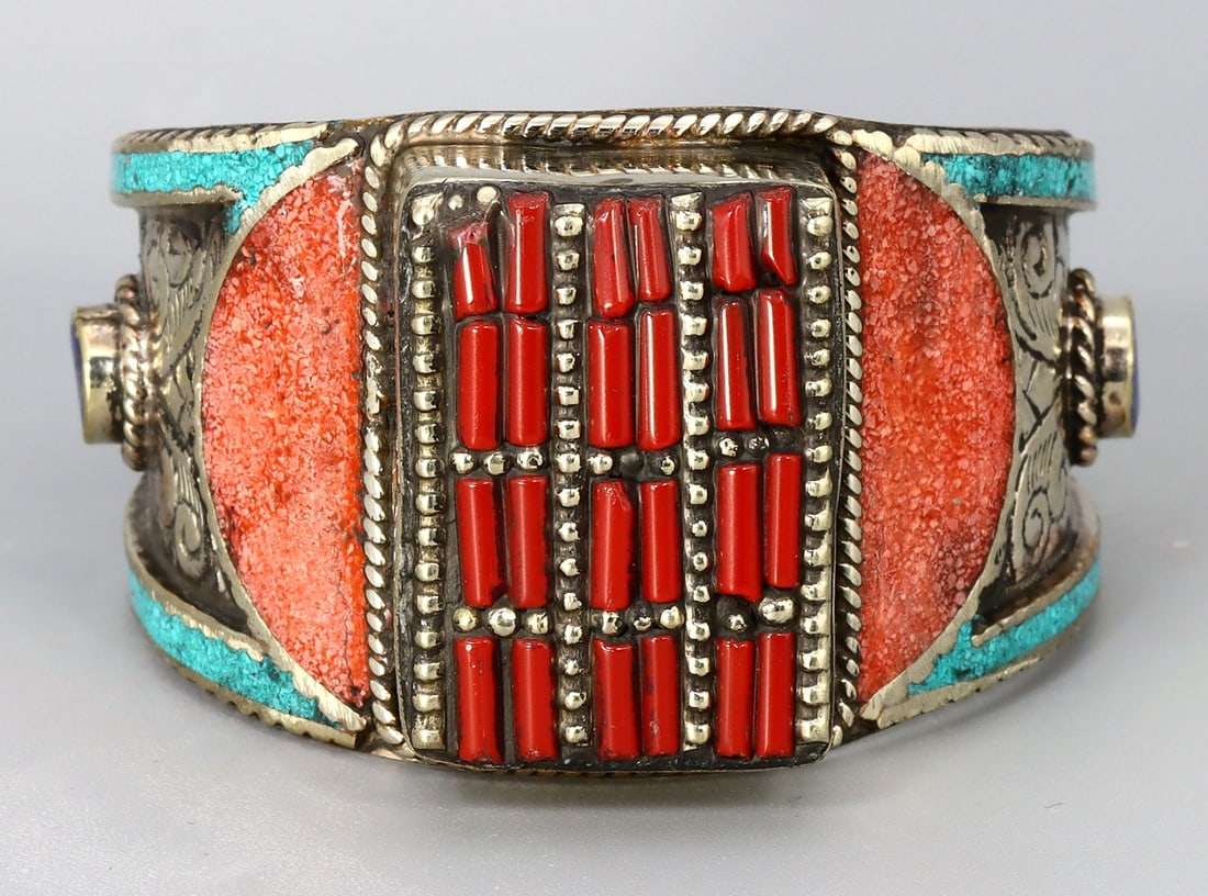 Vintage Tibetan Nepalese Cuff Bangle With Turquoise Coral And Lapis Lazuli Stone: 7.5x6cm Weight: 140 grams (Before Packing) Thousand Planet Auction House Season 4: Ten2Go August Collection Auction. A bargain hunter's, fixer-upper's, and pack-rat's dream come true! Our Ten2Go "ware