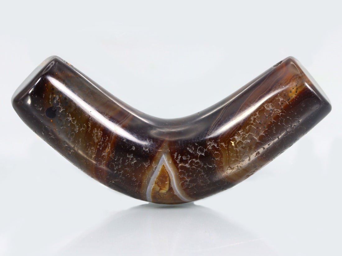 Antique Vintage Old Tibetan Pyu Bow Shaped Banded Agate Eye Bead: 28x58mm Weight: 123 carat (Before Packing) Thousand Planet Auction House Season 5: Ten2Go Antique Beads Collection Auction. A bargain hunter's, fixer-upper's, and pack-rat's dream come true! Our Ten2G