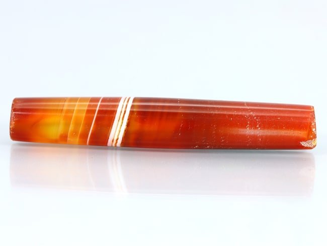 Antique Vintage Old Tibetan Pyu Striped Agate Carnelian Bead: 54.5x8.6mm Weight: 40 carat (Before Packing) Thousand Planet Auction House Season 5: Ten2Go Antique Beads Collection Auction. A bargain hunter's, fixer-upper's, and pack-rat's dream come true! Our Ten