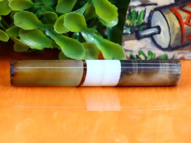 Antique Vintage Old Tibetan Pyu Striped Agate Bead: 57x8.8mm Weight: 40.5 carat (Before Packing) Thousand Planet Auction House Season 5: Ten2Go Antique Beads Collection Auction. A bargain hunter's, fixer-upper's, and pack-rat's dream come true! Our Ten