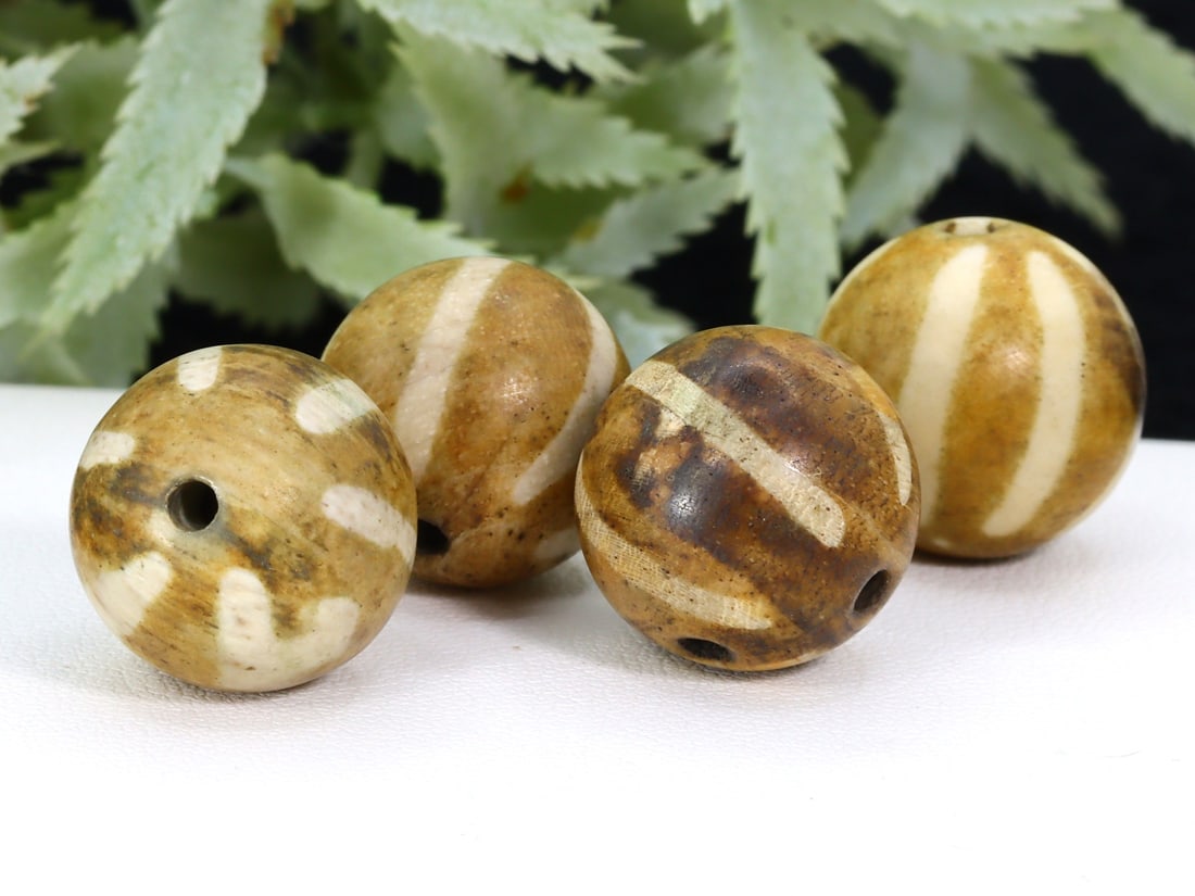 Collection of Old Plum Wood Pumtek Beads Chin Culture Burmese Beads: 16.7x16.5mm Weight: 19.2 grams (Before Packing) Thousand Planet Auction House Season 5: Ten2Go Antique Beads Collection Auction. A bargain hunter's, fixer-upper's, and pack-rat's dream come true! Our