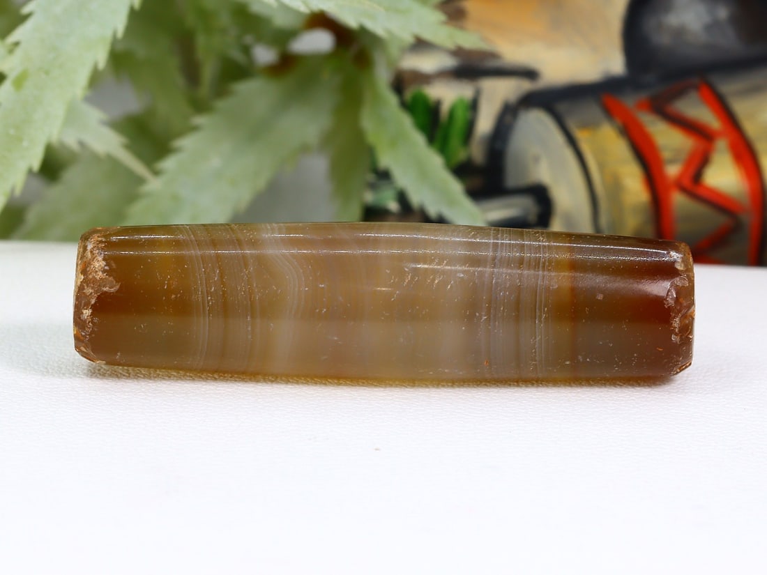 Antique Vintage Old Tibetan Pyu Striped Agate Bead: 38.6x10mm Weight: 34 carat (Before Packing) Thousand Planet Auction House Season 5: Ten2Go Antique Beads Collection Auction. A bargain hunter's, fixer-upper's, and pack-rat's dream come true! Our Ten2