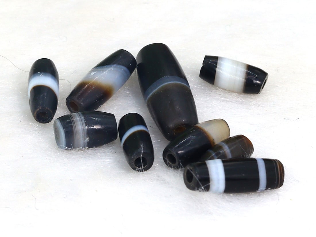 Collection of Ancient Tibetan Agate Single Striped Chung dZi Beads (1 of 2)