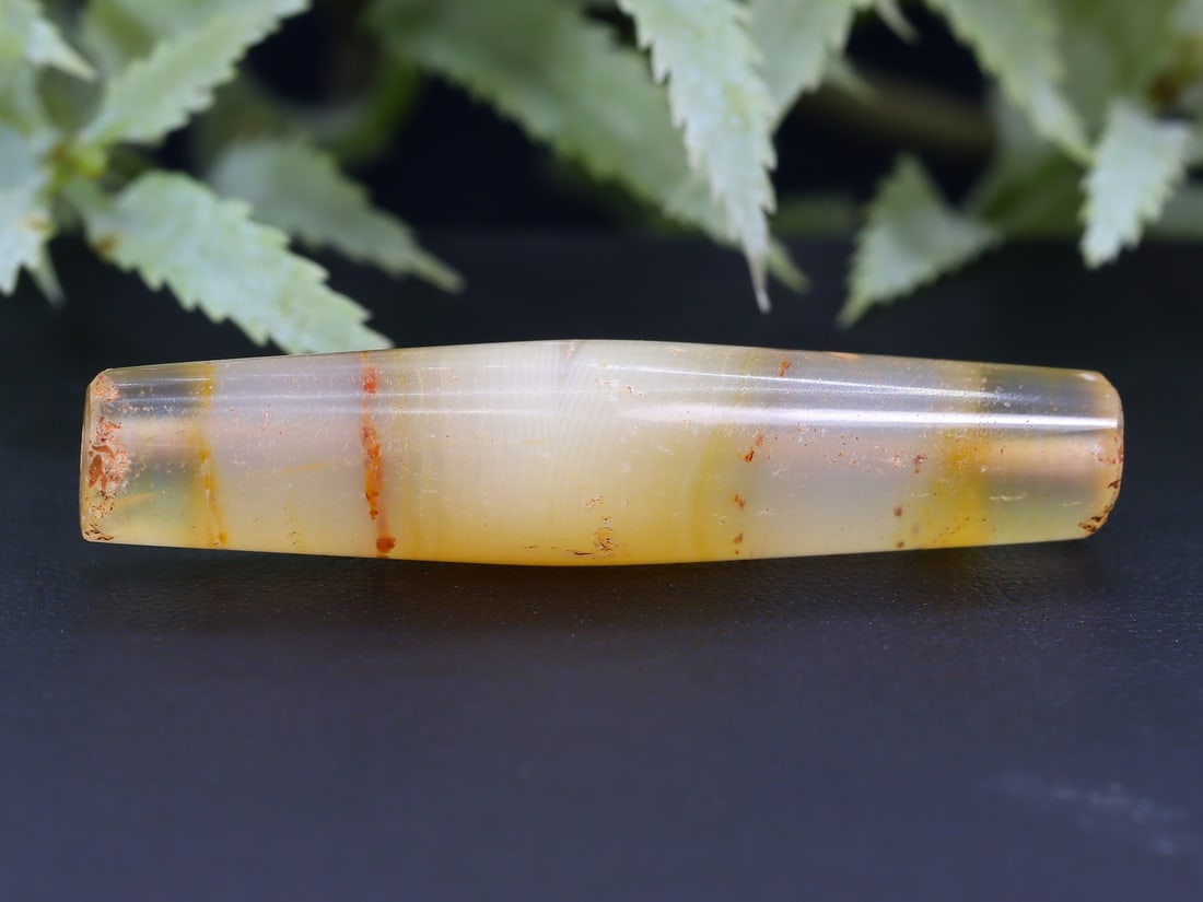 Antique Vintage Old Tibetan Pyu Striped Agate Bead: 46.5x10.4mm Weight: 38.5 carat (Before Packing) Thousand Planet Auction House Season 5: Ten2Go Antique Beads Collection Auction. A bargain hunter's, fixer-upper's, and pack-rat's dream come true! Our