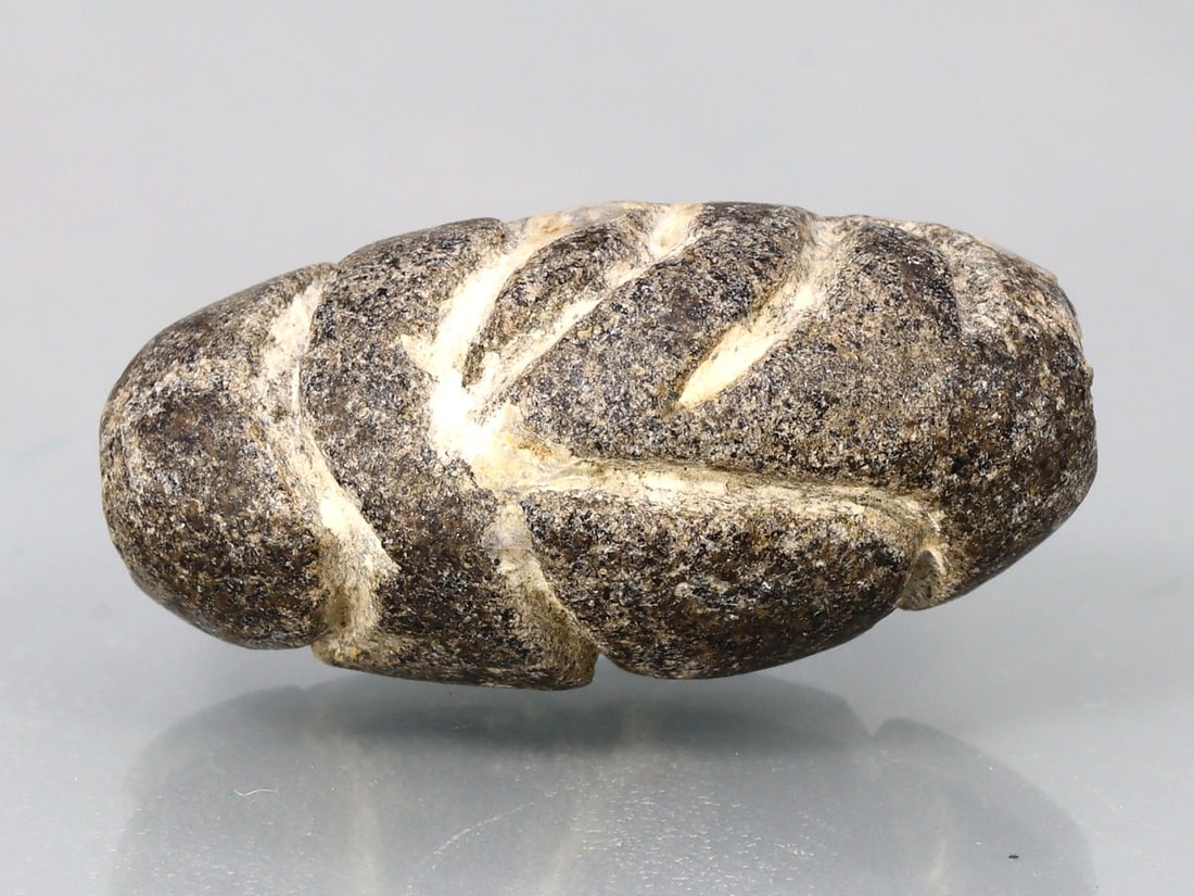 An Antique Mesopotamian Historical Black Steatite Cylinder Seal Bead Asian Art Antique: 21.9x10.4mm Weight: 18 carat (Before Packing) Thousand Planet Auction House Season 5: Ten2Go Antique Beads Collection Auction. A bargain hunter's, fixer-upper's, and pack-rat's dream come true! Our Te