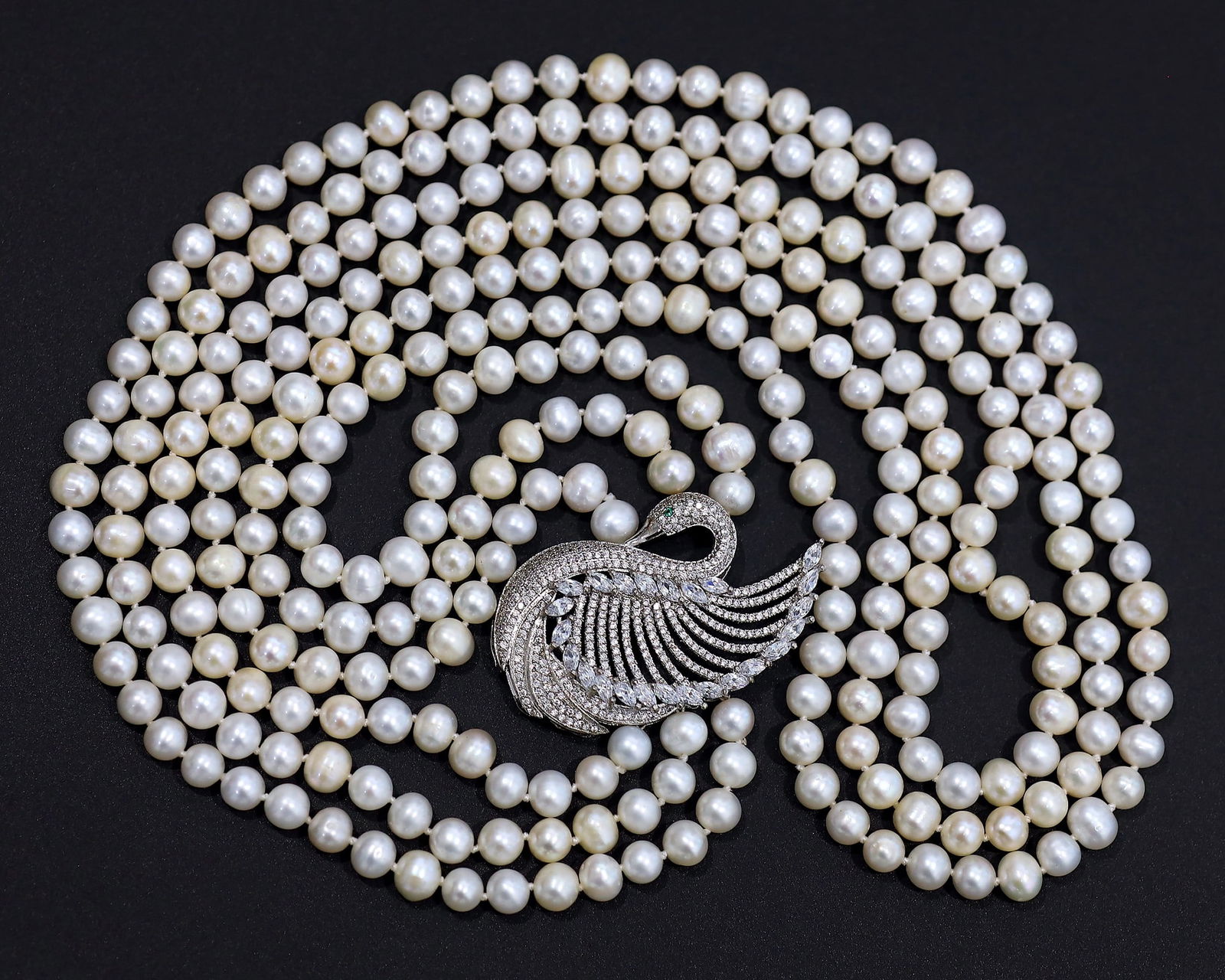 A Multi-Strand Four Strand Freshwater Pearl Necklace Pendant: 32 9/32Inches Weight: 154.3gaems (Before Packing) Thousand Planet Auction House Season 5: Ten2Go Antique Beads Collection Auction. A bargain hunter's, fixer-upper's, and pack-rat's dream come true! Ou
