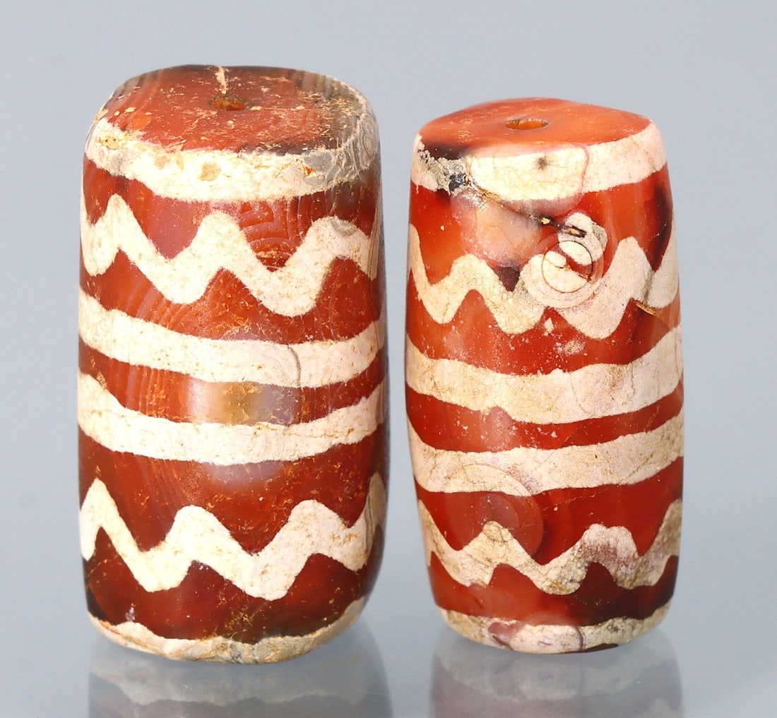 Antique Vintage Indo Tibetan Etched Tiger Tooth Carnelian dZi Beads: 19.9x11.1mm Weight: 37.7 carat (Before Packing) Featuring property of local collections include Europe & Oriental antiques and decorative arts. A truly bargain hunter's, fixer-upper's, and pack-rat's 