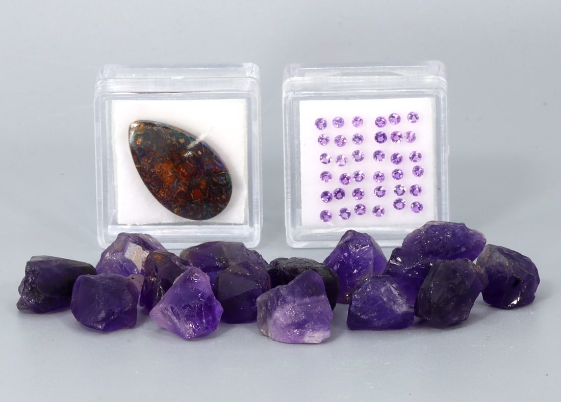 Assorted Collection of Faceted & Rough Amethyst and Boulder Opal: Faceted Amethyst 2mm, Rough Amethyst 10mm-16mm, Boulder Opal 21.5x13mm Weight: Faceted Amethyst 1.05Ct, Rough Amethyst 22.7g, Boulder Opal 11.8Ct (Before Packing) Featuring property of local collectio
