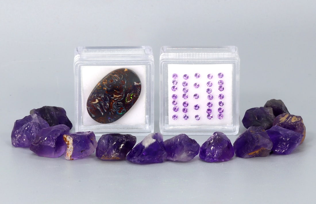 Assorted Collection of Faceted & Rough Amethyst and Boulder Opal: Faceted Amethyst 2mm, Rough Amethyst 10mm-15mm, Boulder Opal 22.3x14.5mm Weight: Faceted Amethyst 1.15Ct, Rough Amethyst 23.5g, Boulder Opal 16.4Ct (Before Packing) Featuring property of local collect