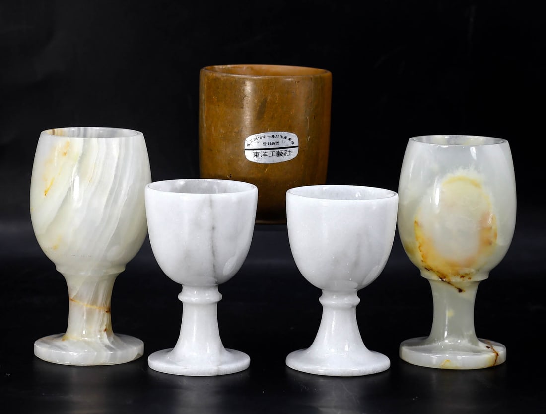 Japanese Stone Marble Tea Cup & 4 Italian Marble Goblets Wine Cups: 9.5x5cm Weight: 678 grams (Before Packing) A bargain hunter's, fixer-upper's, and pack-rat's dream come true! Our Ten2Go "warehouse" style auction presents over thousand lots in a fast-paced old-style