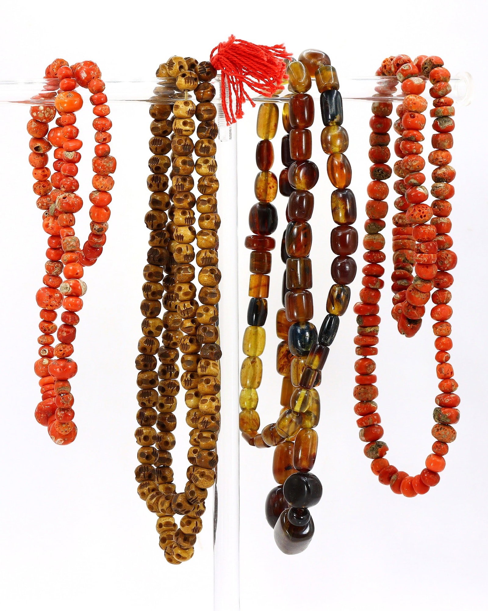 4 Strands of Amber, Red Coral & Tibetan Bone Bead Necklace: 61178 Weight: 80.6 grams (Before Packing) A bargain hunter's, fixer-upper's, and pack-rat's dream come true! Our Ten2Go "warehouse" style auction presents over thousand lots in a fast-paced old-style 