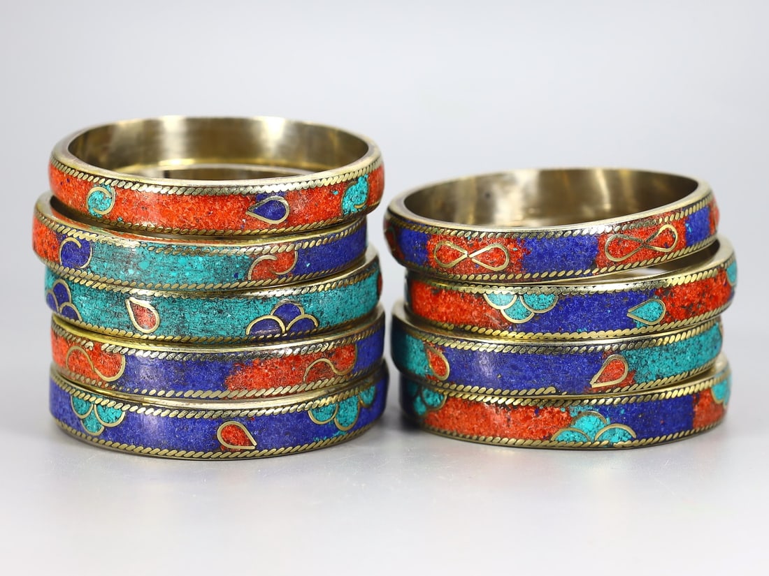 9 Vintage Tibetan Nepalese Cuff Bangles With Turquoise Coral And Lapis Lazuli Stone: 7x7cm Weight: 292 grams (Before Packing) A bargain hunter's, fixer-upper's, and pack-rat's dream come true! Our Ten2Go "warehouse" style auction presents over thousand lots in a fast-paced old-style a