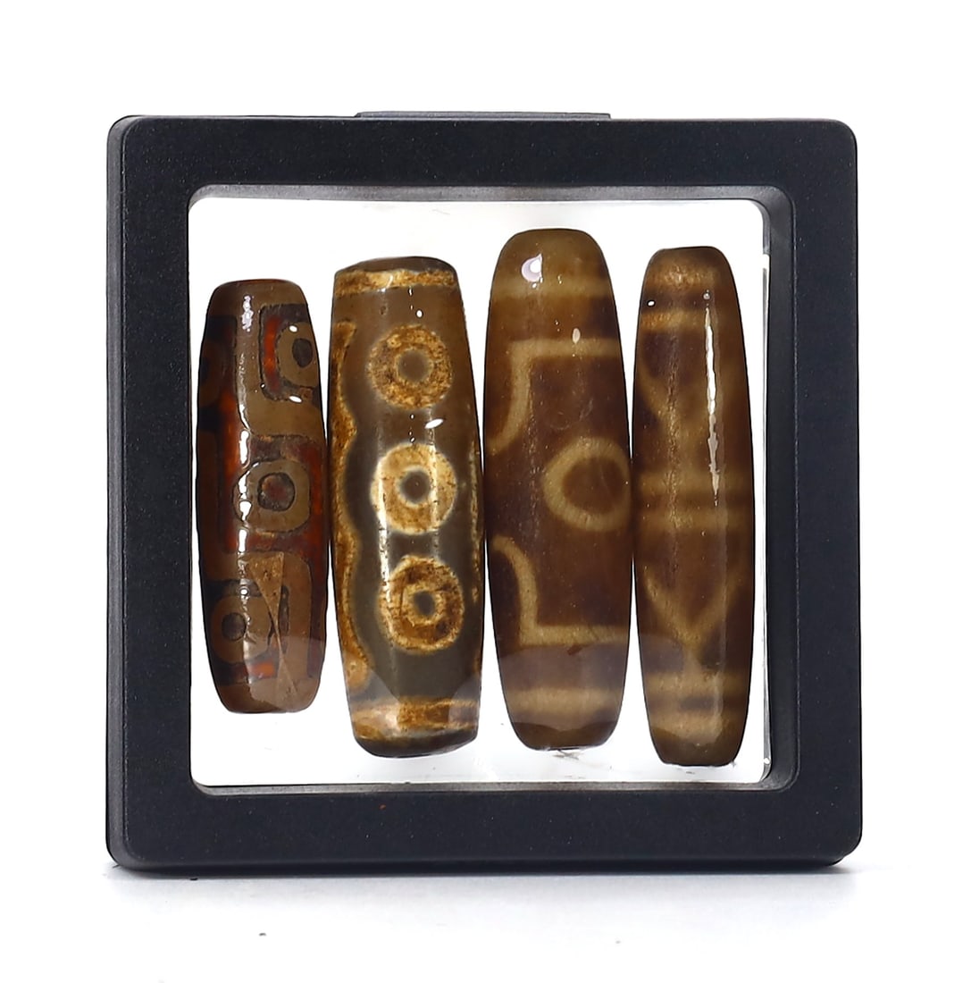 Collection of Four Chinese Tibetan Etched Agate Carnelian dZi Bead: 4-5cm Weight: 76 grams