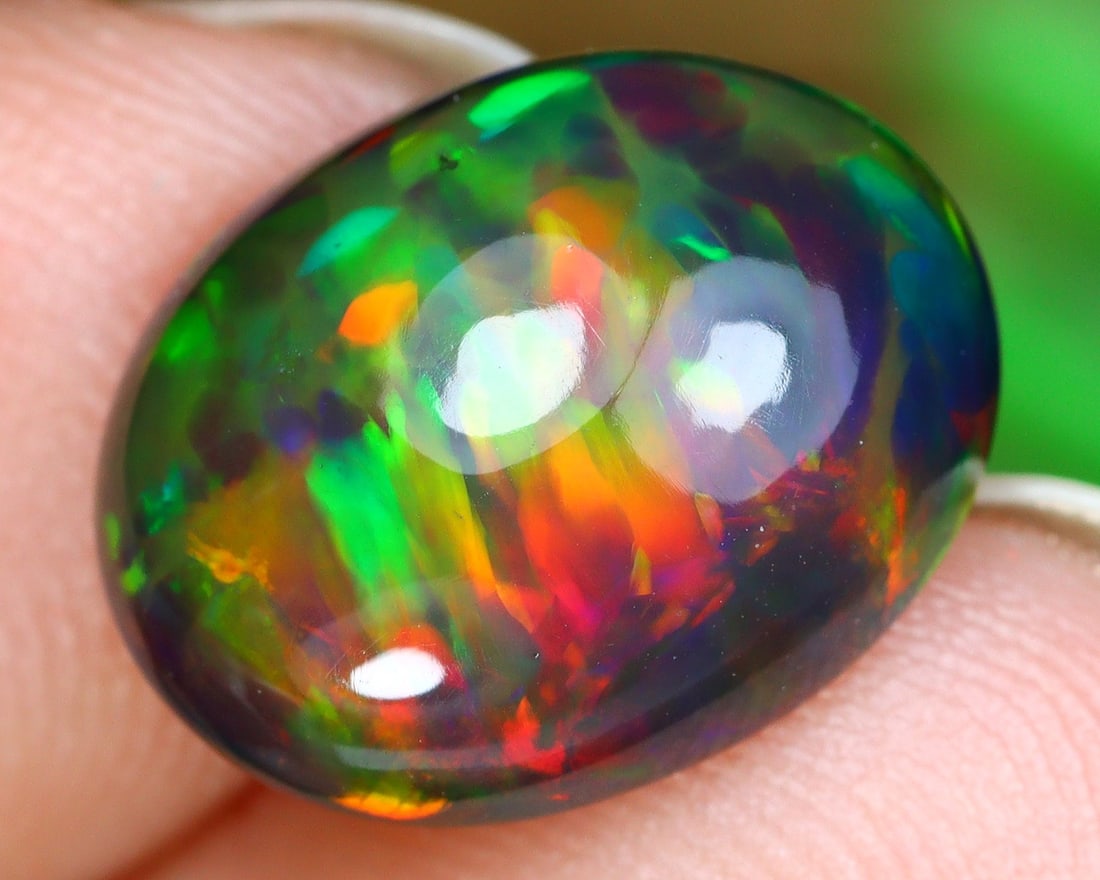 2.94Ct Natural Ethiopian Welo Black Smoke Opal Cabochon: 12x9.5x5.3 Weight: 2.94 Ct