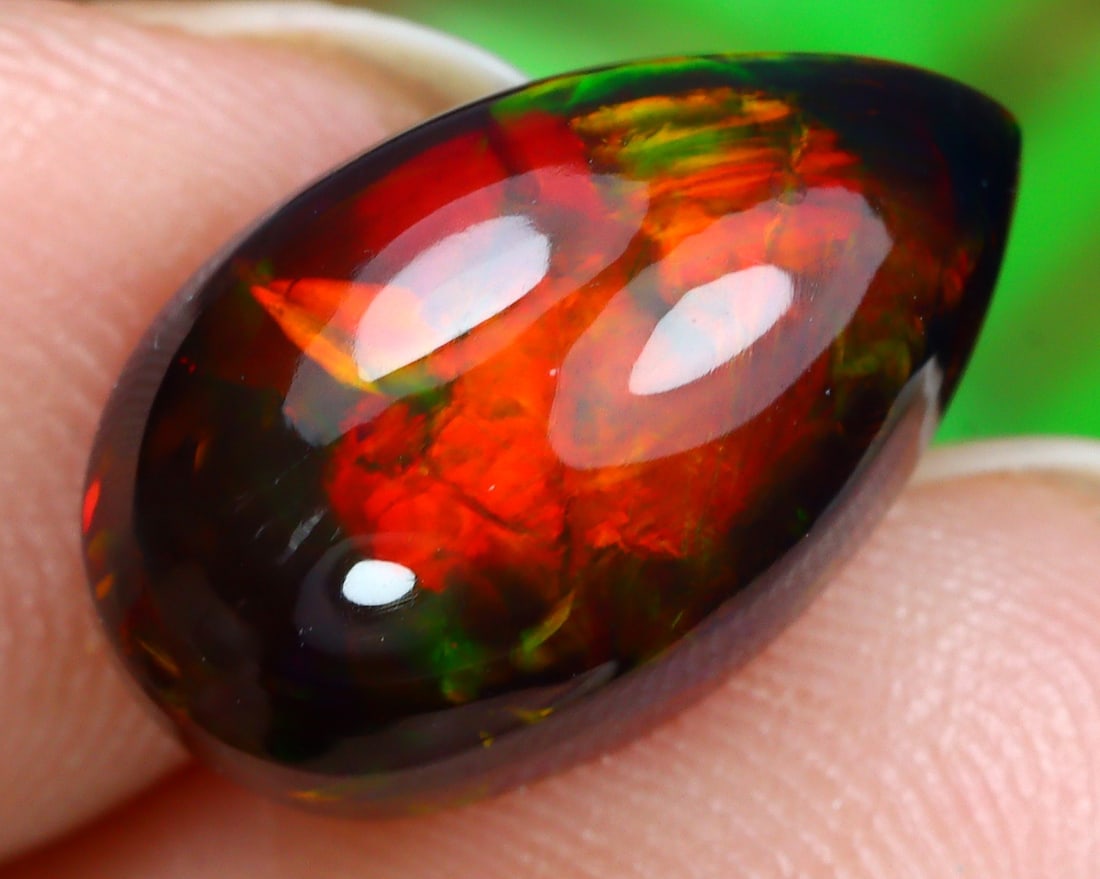 4.10Ct Natural Ethiopian Welo Black Smoke Opal Cabochon: 13.8x8.4x7.3 Weight: 4.10 Ct