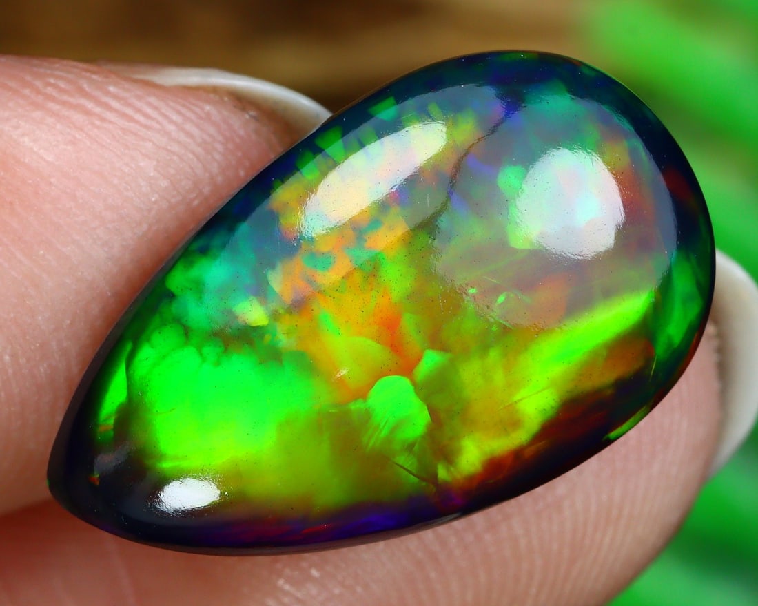 6.88Ct Natural Ethiopian Welo Black Smoke Opal Cabochon: 18.1x10.9x6.5 Weight: 6.88 Ct
