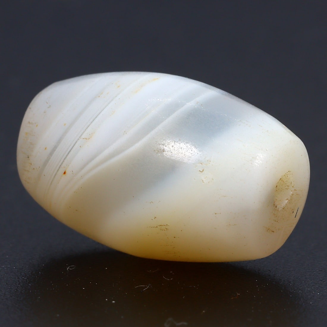 Ancient Banded Agate Bead, Parthian Roman (1stC BC - 3rdC AD): Dimension: 16.9x10.9mm "Journey Through Time: Ancient Bronze Age Beads, Sculpture, and Ornaments, Featuring Himalayan Tibetan Agate Carnelian Dzi Beads" Unearth the timeless allure of ancient beads, s