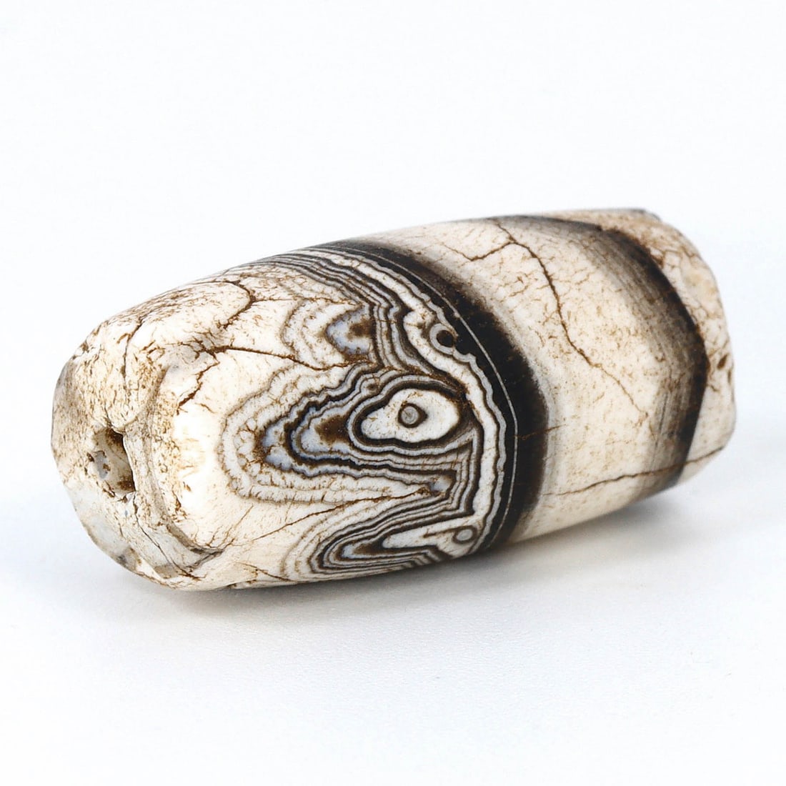 Ancient Sulemani Banded Agate Dzi Bead, Himalayan Pakistan (700 BC - 500 BC): Dimension: 20x9.7mm "Journey Through Time: Ancient Bronze Age Beads, Sculpture, and Ornaments, Featuring Himalayan Tibetan Agate Carnelian Dzi Beads" Unearth the timeless allure of ancient beads, scul