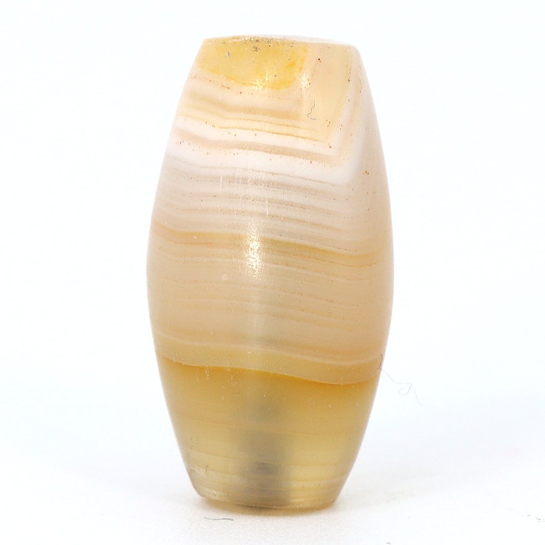 Antique Banded Agate Dzi Bead, Himalayan (1650 AD - 1800 AD): Dimension: 16.8x9.2mm "Journey Through Time: Ancient Bronze Age Beads, Sculpture, and Ornaments, Featuring Himalayan Tibetan Agate Carnelian Dzi Beads" Unearth the timeless allure of ancient beads, sc