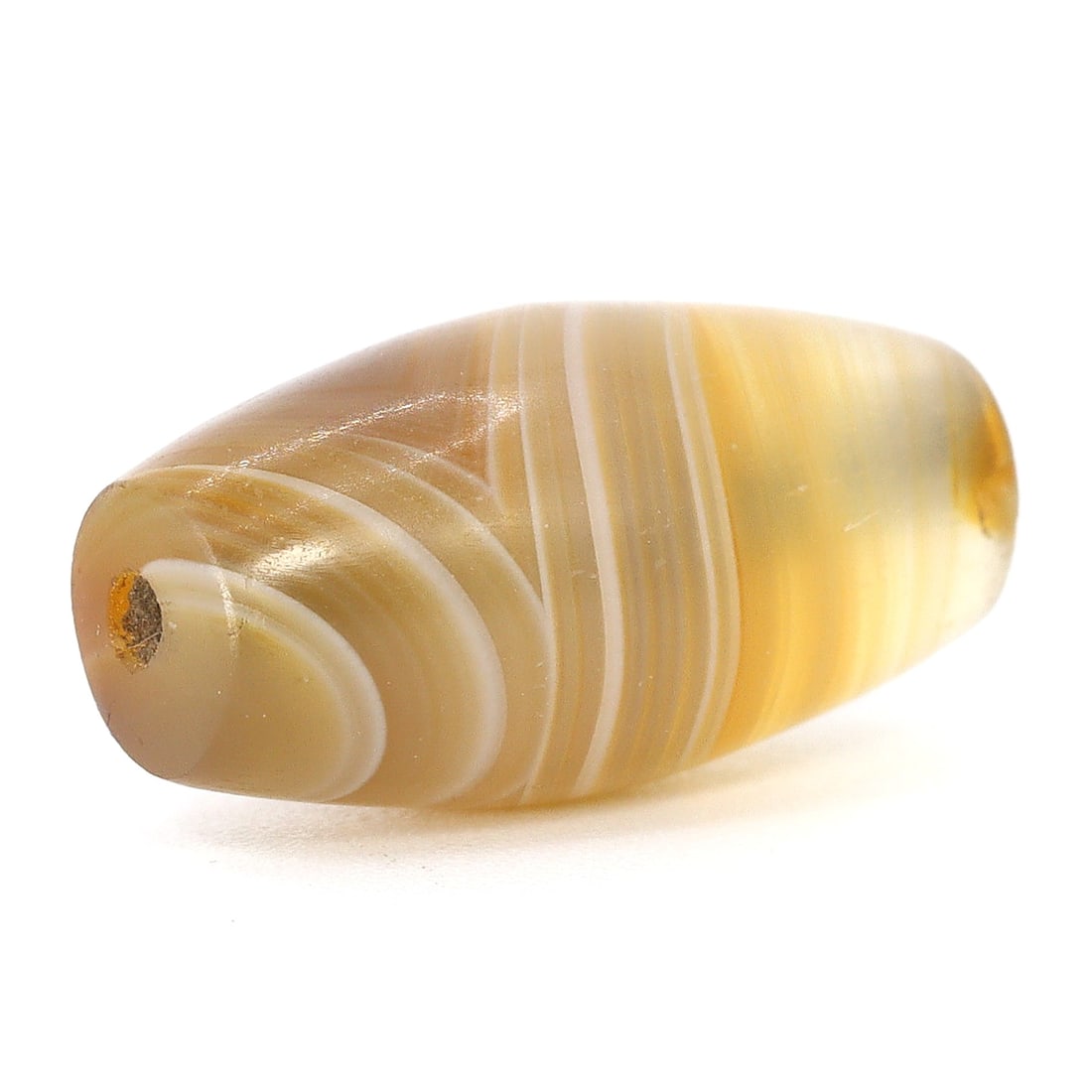 Antique Banded Agate Dzi Bead, Himalayan (1650 AD - 1800 AD): Dimension: 17.5x8.9mm "Journey Through Time: Ancient Bronze Age Beads, Sculpture, and Ornaments, Featuring Himalayan Tibetan Agate Carnelian Dzi Beads" Unearth the timeless allure of ancient beads, sc