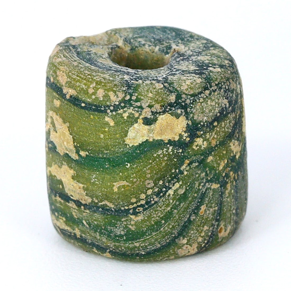 Ancient Banded Mosaic Glass Bead, Ptolemaic Period (323 BC - 30 BC): Bead Dimension: 8.7x7.8mm in size Discover the Timeless Beauty of Ancient Beads with Thousand Planet Auction House Beneath the sands of history lie treasures that transcend time-ancient beads that bea