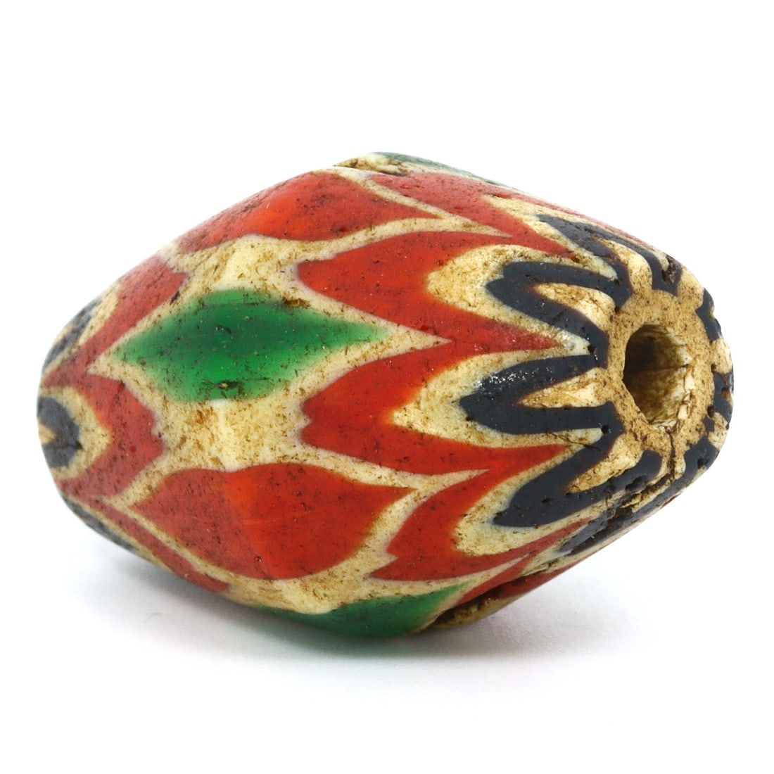 Antique Glass Chevron Bead, Venice (1600 AD - 1700 AD): Bead Dimension: 29x18.6mm in size Discover the Timeless Beauty of Ancient Beads with Thousand Planet Auction House Beneath the sands of history lie treasures that transcend time-ancient beads that bea
