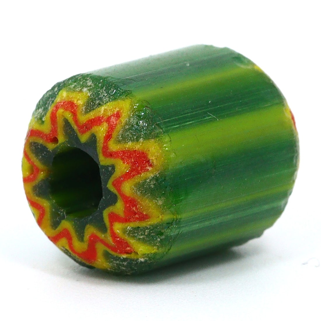 Antique Glass Chevron Bead, Venice (1600 AD - 1700 AD): Bead Dimension: 13x11.3mm in size Discover the Timeless Beauty of Ancient Beads with Thousand Planet Auction House Beneath the sands of history lie treasures that transcend time-ancient beads that bea