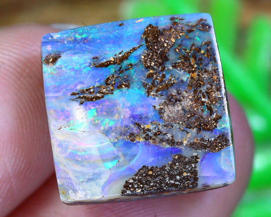 Australian Koroit Matrix Boulder Opal: Vibrant Tapestry of Nature's Brilliance: Dimension: 13x13x6mm Weight: 11.5Ct Estimate: $220-$460 In recent auctions, Australian Koroit Matrix Boulder Opals have witnessed an increasing demand. An opal of similar quality and pattern was aucti