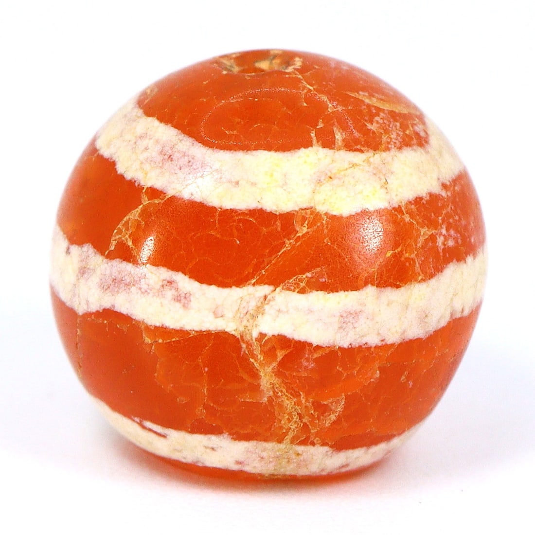 Pyu Era: Exquisite Etched Carnelian Bead, 2nd Century BCE - 9th Century CE: Dimension: 10.3x9.5mm Rarity Level: Highly Rare This bead, stemming from the Pyu era, represents a unique piece of history from an ancient civilization that existed nearly two millennia ago. Estimate: