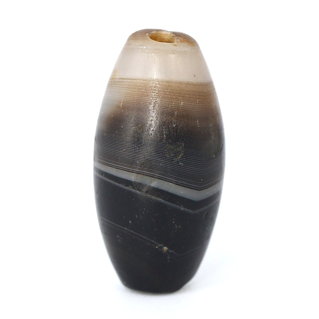 Distinguished Islamic Epoch Banded Agate Relic: Emblem of History (8th-13th Century AD): Dimension: 16x7.7mm Rarity Level: Exceptional Rarity Given its roots in the Islamic epoch, the age and historical background make it a significantly rare artifact. Estimate: $250-$450 Remark: Consider