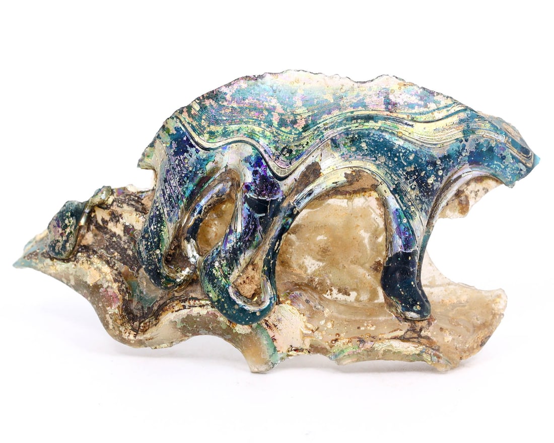 Roman Metallurgical Glass Slags: Testament of Ancient Artistry (1 BCE-400 CE): Dimension: 5.5x3cm Rarity Level: Remarkably Rare Given the age and historical significance, combined with their unique appearance and origin from the Roman Empire's peak of metallurgy, these items are