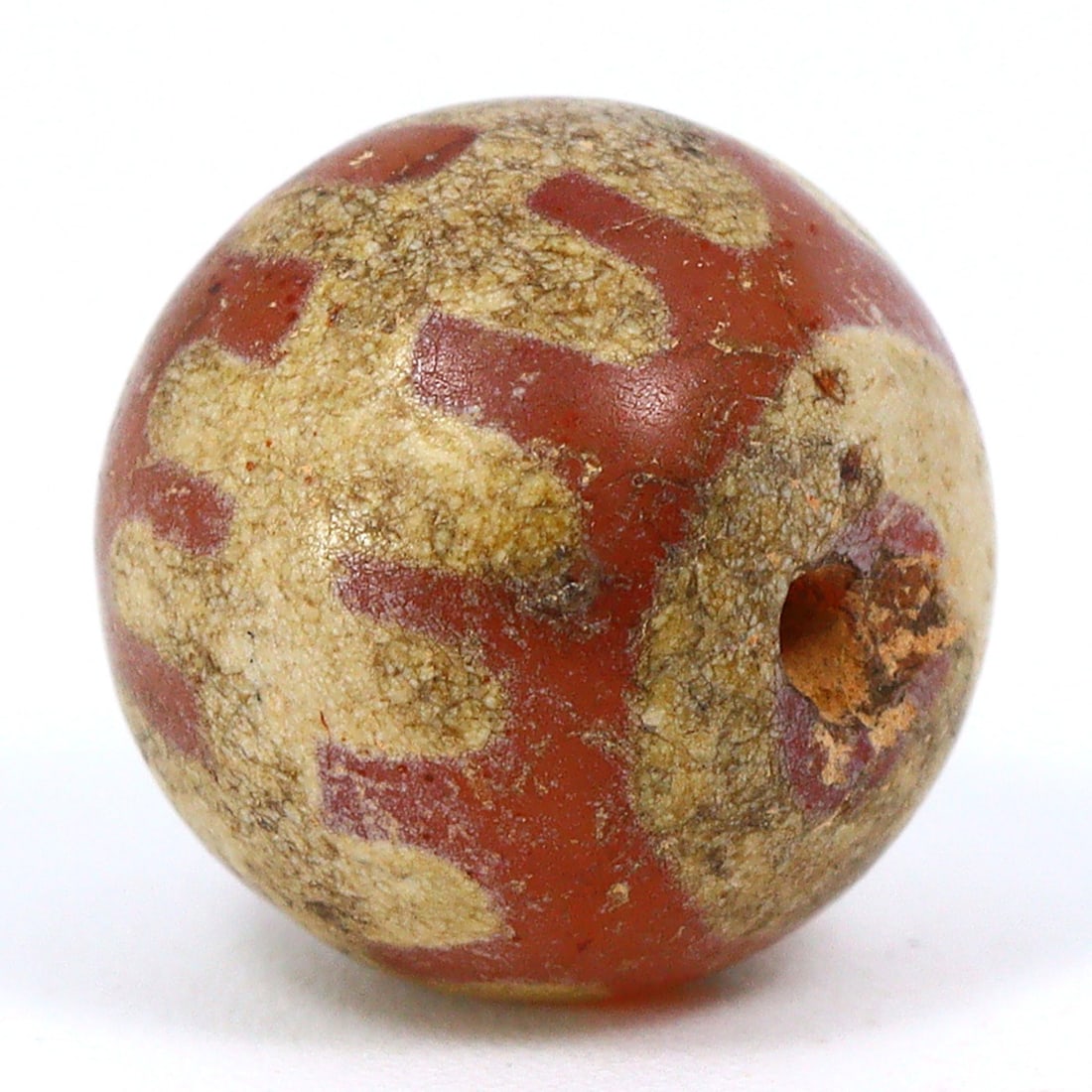 Myanmar's Historical Craft: Pyu Carnelian Bead, 2nd Century BCE - 9th Century CE: Dimension: 9.5x9.3mm Rarity Level: Highly Rare This bead, stemming from the Pyu era, represents a unique piece of history from an ancient civilization that existed nearly two millennia ago. Estimate: 