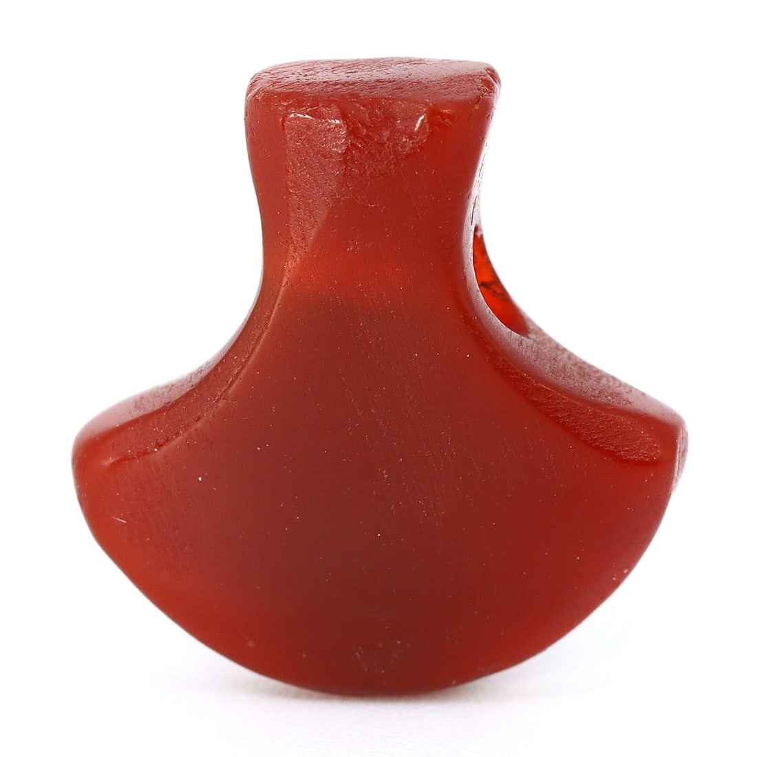 Ancient Indian Carnelian Axe Bead: Emblem of Timeless Artistry (c. 600-1500 AD): Dimension: 13.7x13.2mm Rarity Level: Rare Considering its historical roots traced back to ancient India, combined with its unique axe-shaped design made of carnelian and chalcedony, this bead embodies
