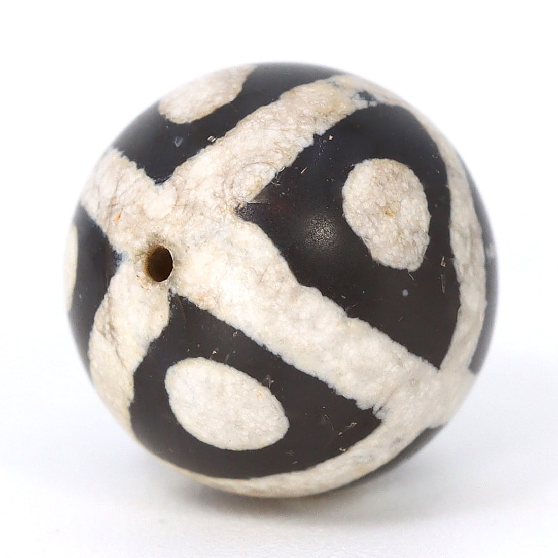 Pyu Craftsmanship: Historical Etched Carnelian Bead, 2nd Century BCE - 9th Century CE: Dimension: 9.2mm Rarity Level: Highly Rare This bead, stemming from the Pyu era, represents a unique piece of history from an ancient civilization that existed nearly two millennia ago. Estimate: $280