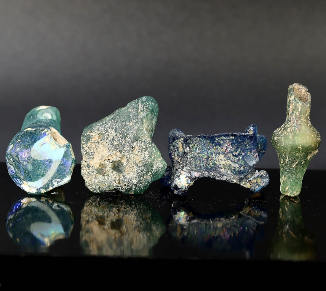 Luminous Glass Slags of Past Roman Era: A Glimpse into Ancient Craftsmanship (1 BCE-400 CE): Dimension: 3x2cm Rarity Level: Remarkably Rare Given the age and historical significance, combined with their unique appearance and origin from the Roman Empire's peak of metallurgy, these items are s