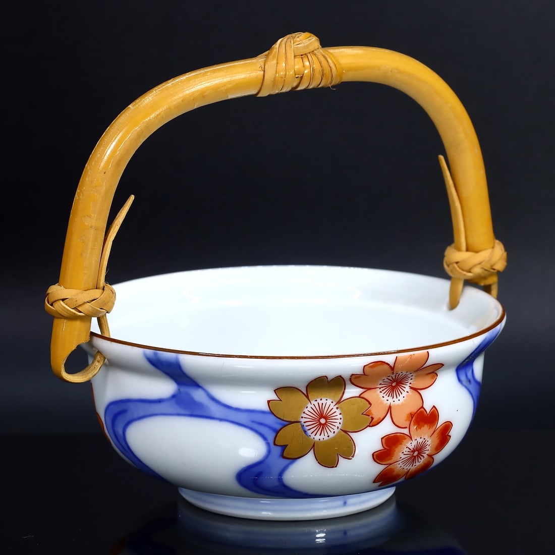 Blue and White Porcelain Bowl with Floral Accents: Asian Ming Dynasty Inspired Design: Dimension: 8x3.5cm Weight: 63gram Introduction: Echoing the grace of the Ming Dynasty style, this porcelain bowl is an embodiment of refined aesthetics. Draped in a pristine white hue, it is meticulou
