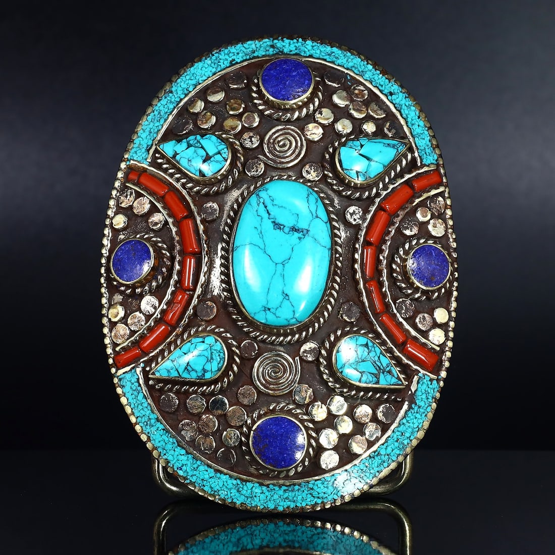 Authentic Vintage Tibetan Belt Buckle with Tribal Silver and Colorful Inlay: Dimension: 8x6 cm Weight: 104 gram Introduction: Behold an extraordinary piece of history, the Authentic Vintage Tibetan Belt Buckle with Tribal Silver and Colorful Inlay. This remarkable belt buckle 