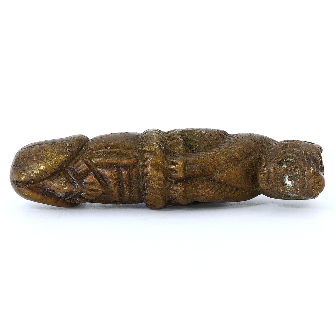 Vintage Brass Thai Talisman: A Symbol of Protection and Potency: Dimension: 8x2cm Weight: 124gram Introduction: This vintage brass Thai amulet is a robust embodiment of cultural beliefs and talismanic tradition. With its unique phallic form, it carries the ancestra