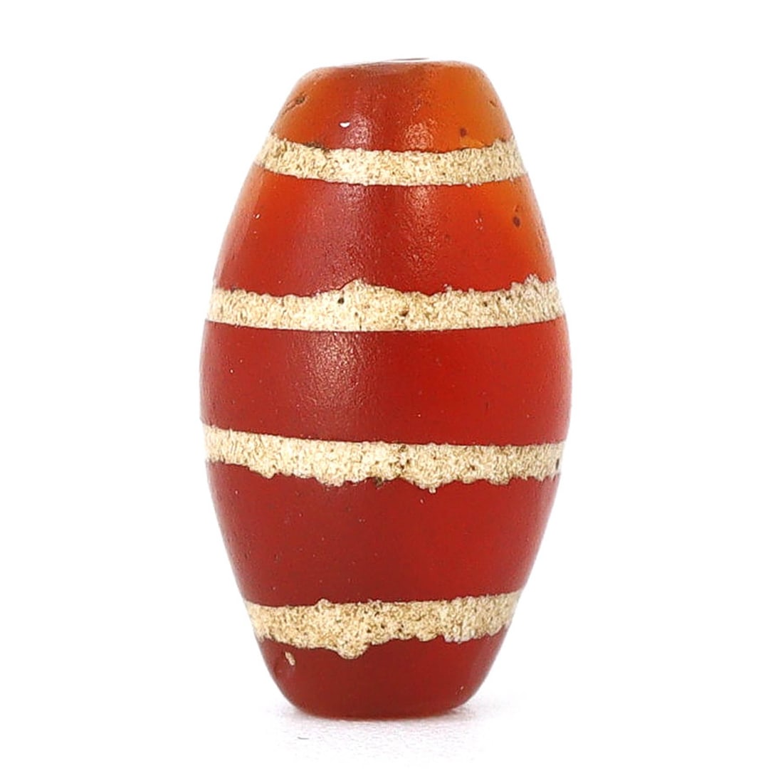 Ancient Himalayan Tibetan Etched 4-Stripe Carnelian Chung Dzi Bead (Circa 8th-11th Century): Dimension: 11.3x6.5mm Introduction: Embark on a historical odyssey with this ancient Tibetan 4-striped Chung Dzi bead, hailing from the enigmatic Medieval Period, specifically dated around the 8th to 
