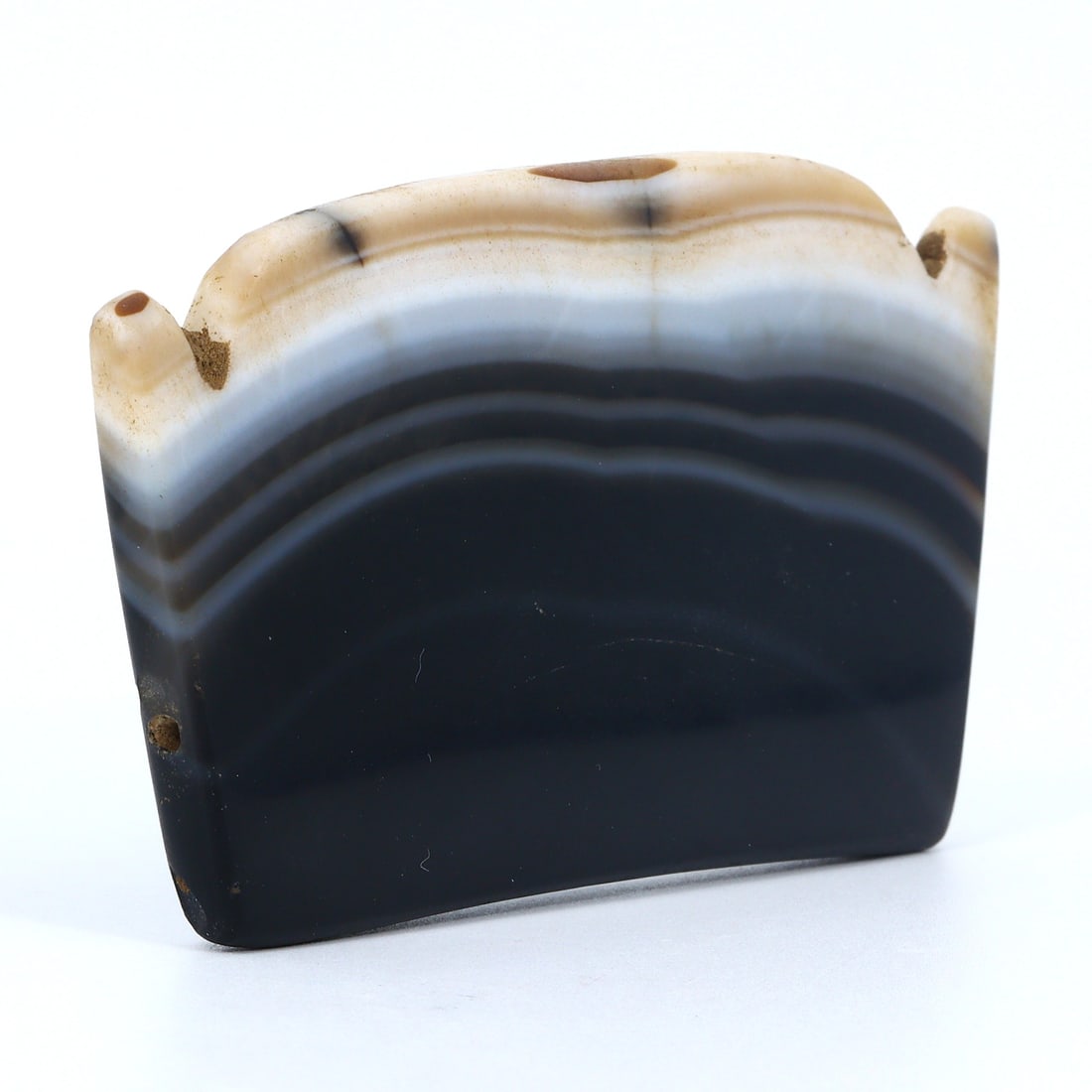 Magnificent Ancient Persian Bow-Shaped Banded Agate - Achaemenid to Parthian Era (550-330 BC): Dimension: 75.8x41.3mm Introduction: Immerse yourself in the grandeur of ancient Persia with this bow-shaped banded agate, a relic from the illustrious period of the Achaemenid to the Parthian Empire.