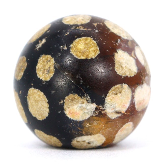 Ancient Pyu Trade Gem: Etched Carnelian dZi Beads, 2nd Century BCE - 9th Century CE: Dimension: 10.3mm Rarity Level: Highly Rare This bead, stemming from the Pyu era, represents a unique piece of history from an ancient civilization that existed nearly two millennia ago. Estimate: $28
