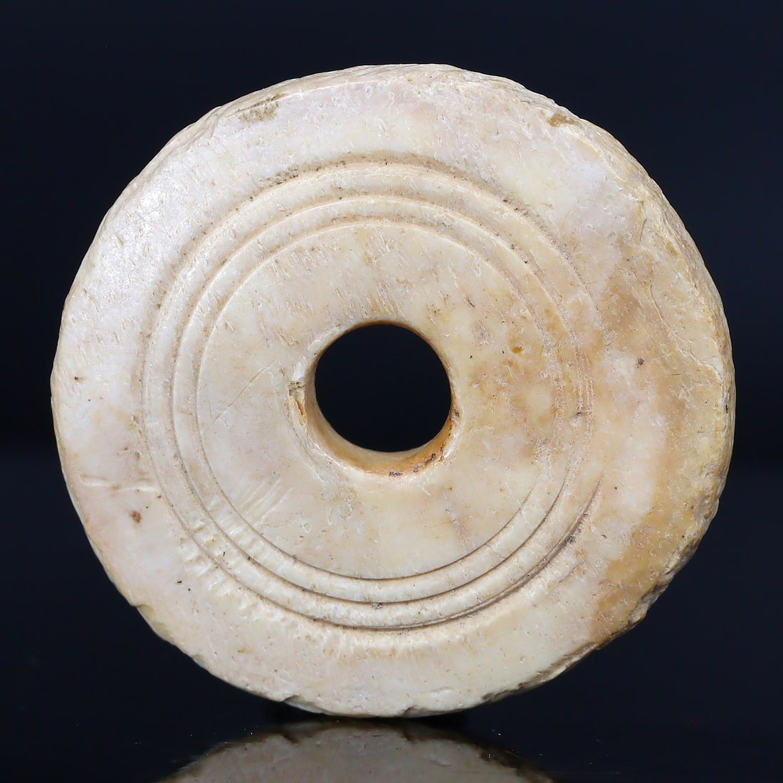 Ancient Whorl Beads of Central Asia: A Nod to the Achaemenid Epoch (6th-4th Century BC): Dimension: 26x5mm Rarity Level: Highly Rare These beads are from the Achaemenid Empire period, making them over two millennia old. Such artifacts are rarely found in this condition. Estimate: $200-$40