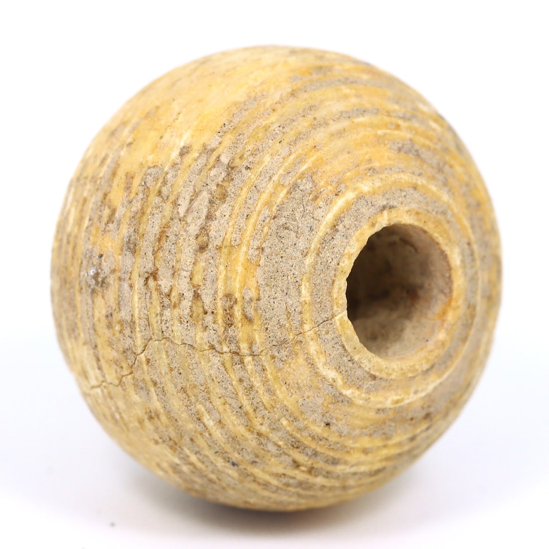Bone Whorls of the Achaemenid Era: Central Asian Symbols of Timeless Craft (6th-4th Century BC): Dimension: 16x13mm Rarity Level: Highly Rare These beads are from the Achaemenid Empire period, making them over two millennia old. Such artifacts are rarely found in this condition. Estimate: $200-$4