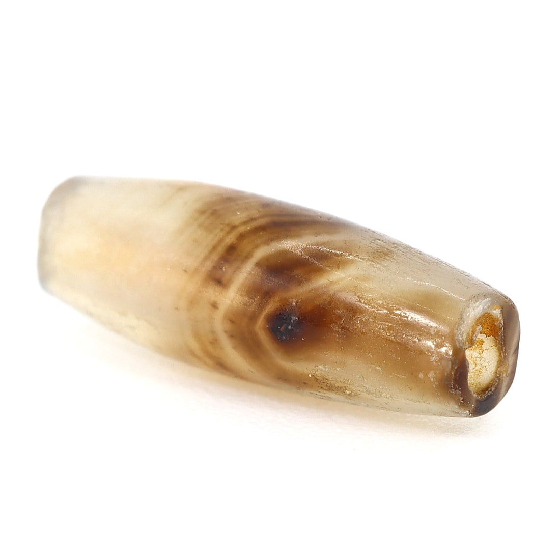 Tiny Agate Bead from the Indus Valley Civilization: Echoes of an Ancient World (ca. 3300-1300 BCE): Dimension: 10.8x3.8mm Rarity Level: Exceptionally Rare Given its historical significance from the Indus Era and the preservation of the gem. Estimate: $150-$300 Introduction: The banded agate gem