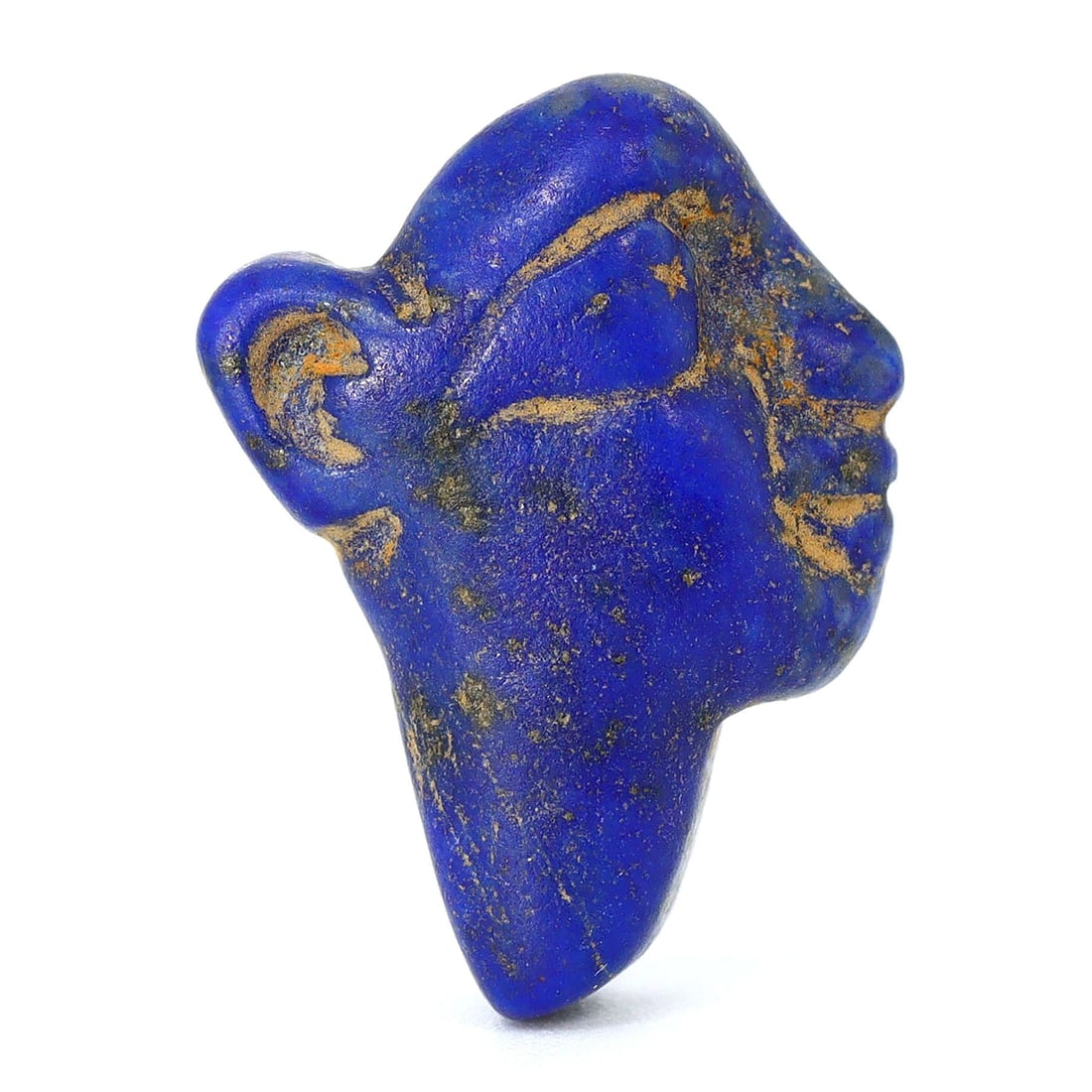 Byzantine Lapis Lazuli Human Face Bead, Echoes of Antiquity (400-600 AD): Dimension: 19x14mm Introduction: This lapis lazuli bead, carved with the visage of a human face, evokes the deep spirituality and artistry of the Byzantine Empire. Dated between 400 and 600 AD, it cap