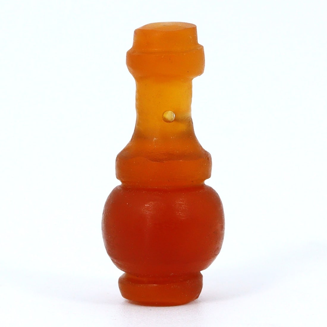 Exquisite Late Medieval South Asian Carnelian Bead (Circa 1400-1500 AD): Dimension: 20x9mm Introduction: Embark on a historical journey with this exceptional carnelian bead from the late medieval period of South Asia, estimated to be from the years 1400 to 1500 AD. This pi