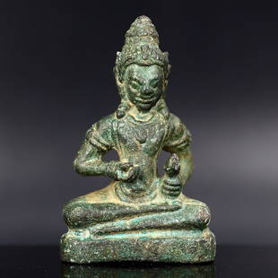 Sublime Khmer-Style Southeast Asian Buddha Figurine in Alloy (9th-12th Century): Dimension: 55x35mm Introduction: Presenting an exquisite specimen of spiritual artistry, this ancient Buddha figurine, reminiscent of the celebrated Khmer style, is a testament to the zenith of Southe