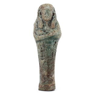 Ancient Egyptian Faience Deity Figurine, New Kingdom, 1550-1070 BC: This ancient Egyptian faience figurine, standing at approximately 9 cm (3.54 inches) in height, dates back to the New Kingdom period, between 1550 and 1070 BC. The artifact depicts a deity, evidenced