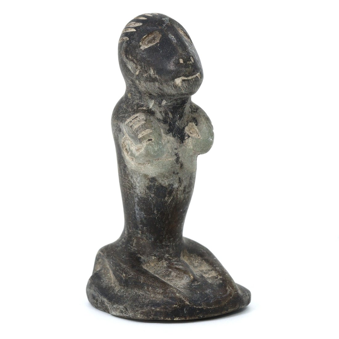 Ancient Bactria-Margiana Seated Female Chlorite Figure (2100-1700 BC): This steatite or chlorite figure, standing 7 cm in height and 4 cm in width, or approximately 2.76 x 1.57 inches, represents a seated female figure from the Bactria-Margiana Archaeological Complex (BC